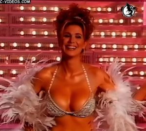 Flavia Palmiero dancing in her showgirl costume (busty beauty)